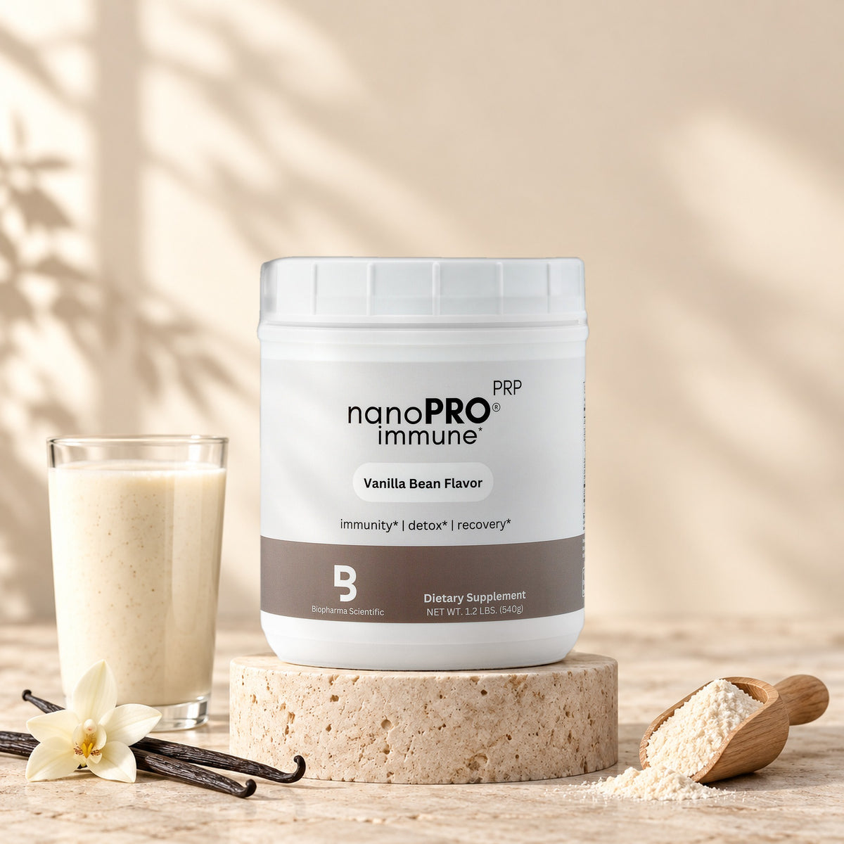 NanoPro Immune Vanilla tub in a bright studio still life with fresh ingredients