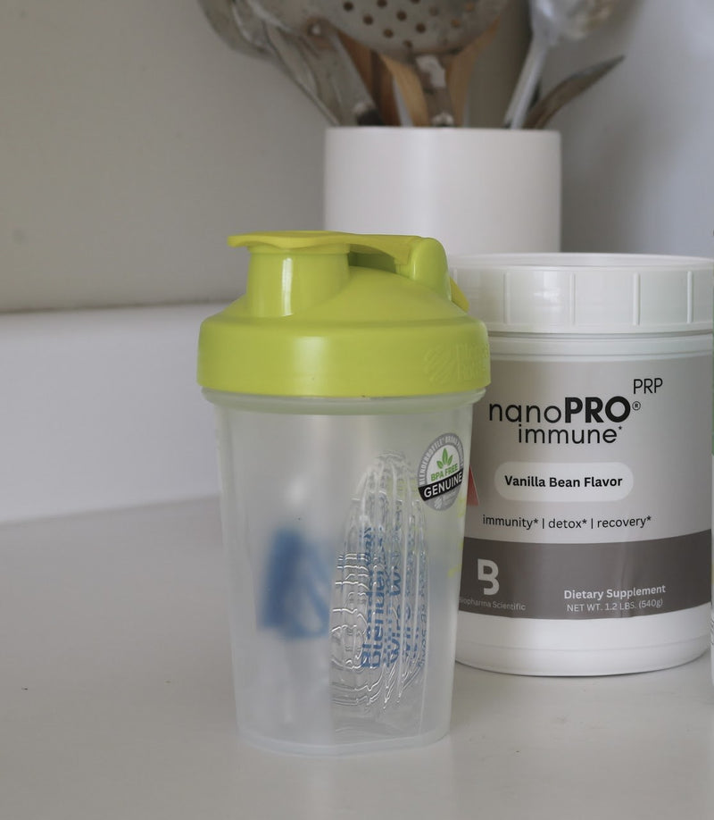 nanoPRO immune vanilla bean tub and a shaker bottle on a kitchen counter