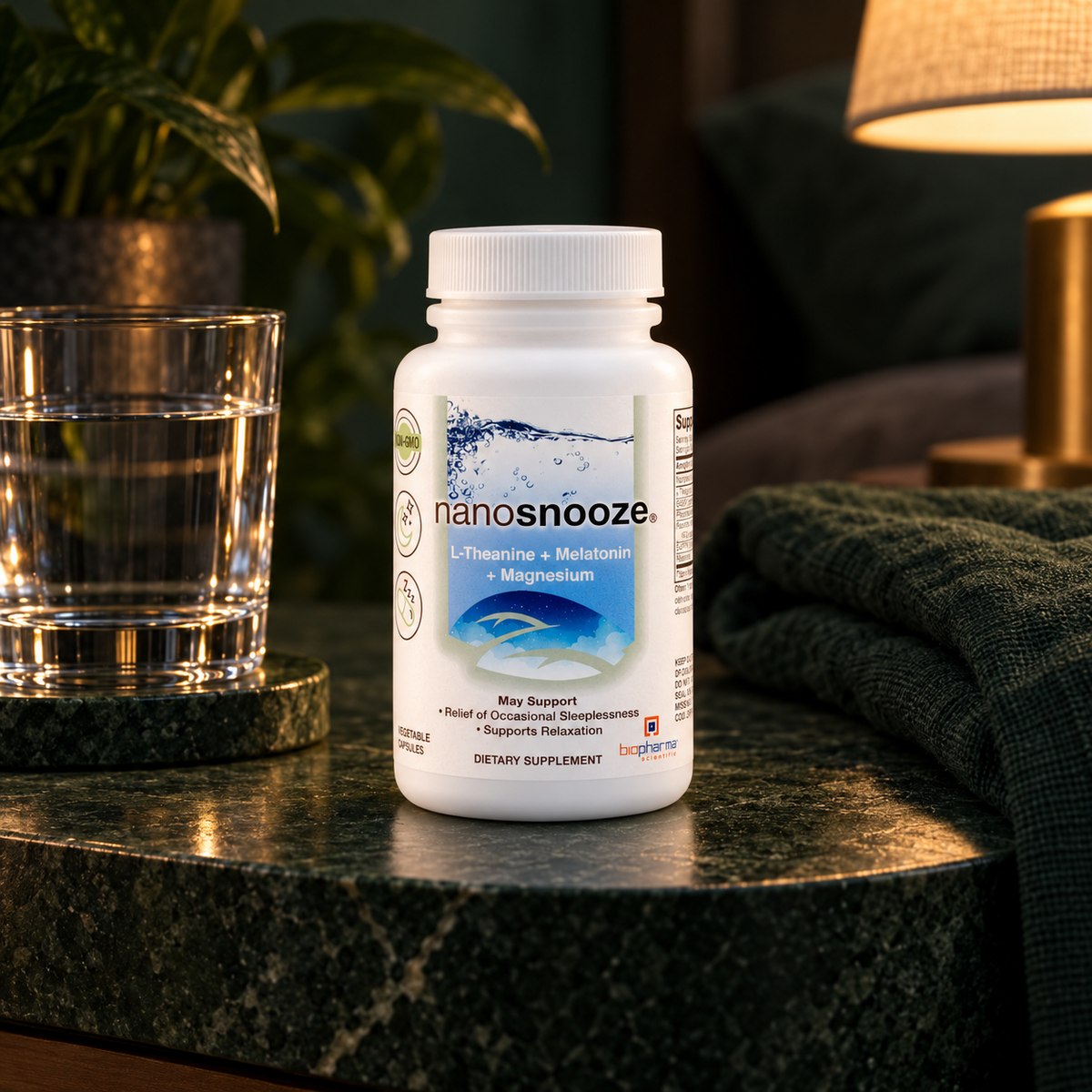 NanoSnooze capsules in a quiet forest green bedside setting